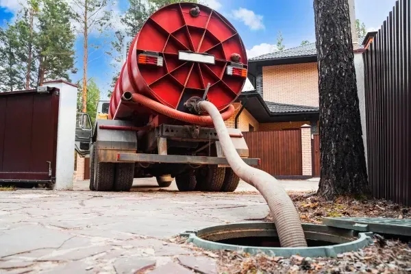 Septic tank vacuum truck pumping and cleaning residential sewer system