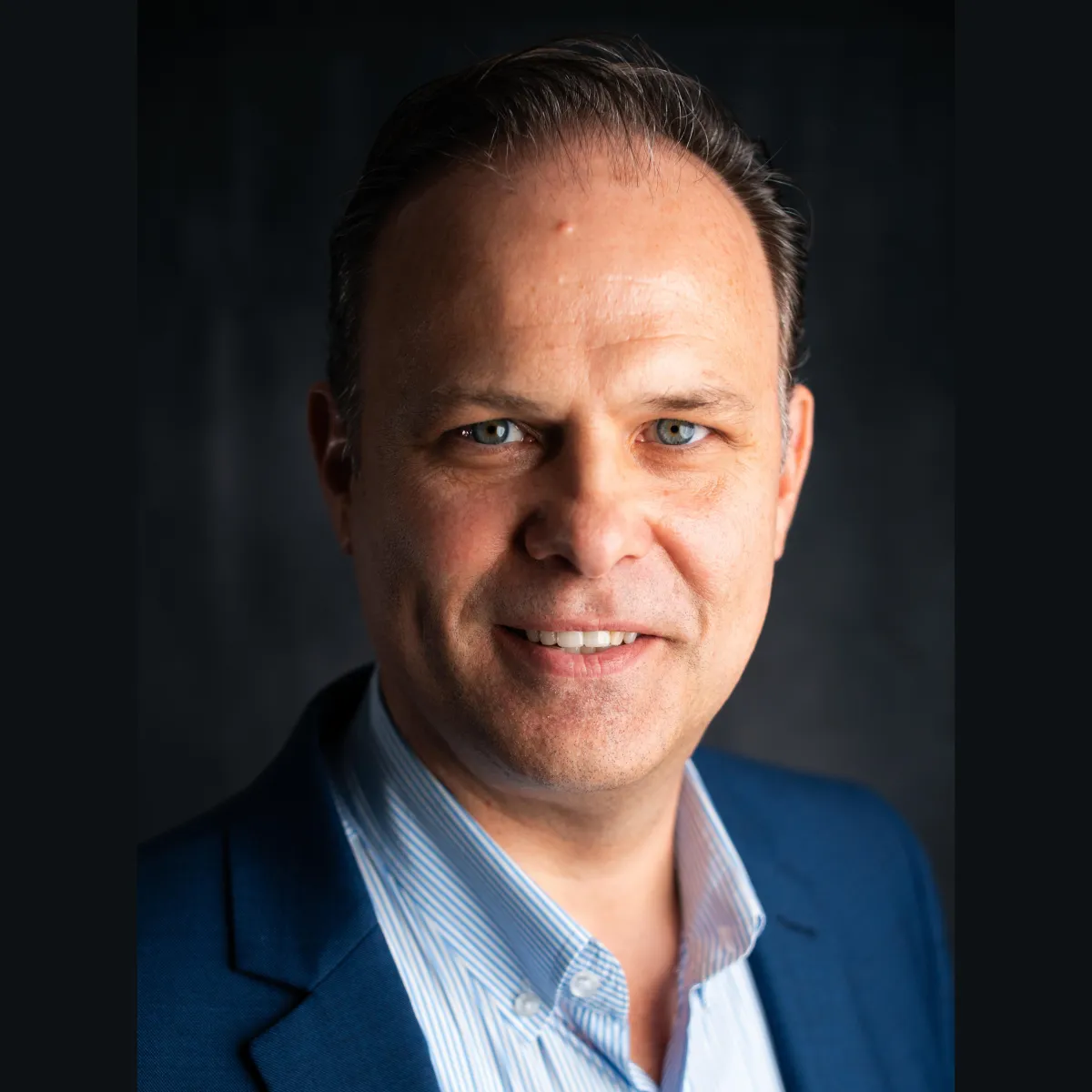 Tony Domenzain headshot