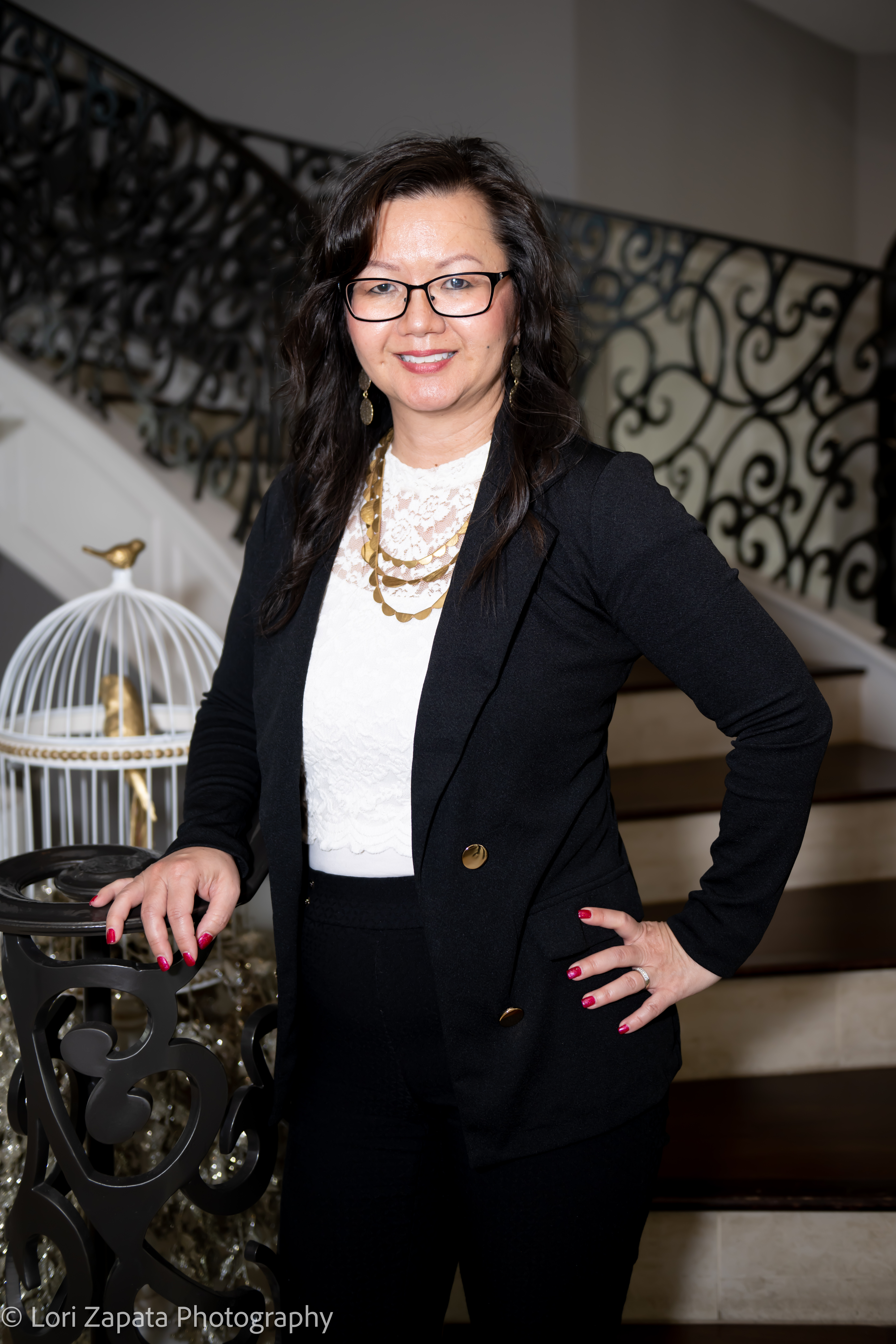 group of people taking photo near brown wooden tree