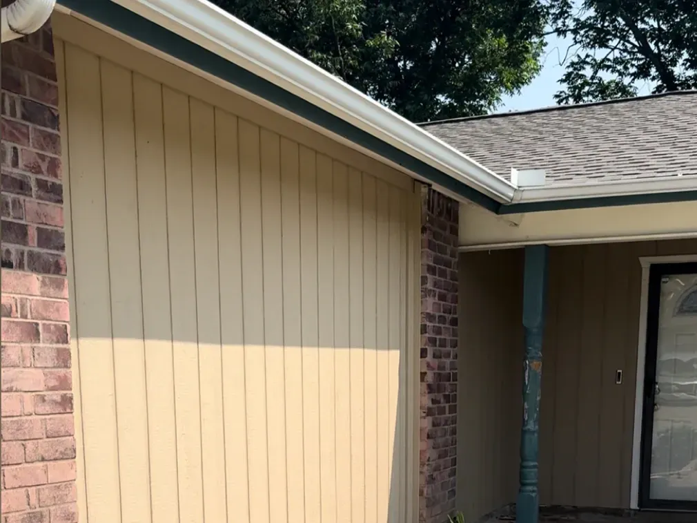 Newly renovated Arlington TX bathroom with modern fixtures, freestanding tub, glass shower, and stylish decor.