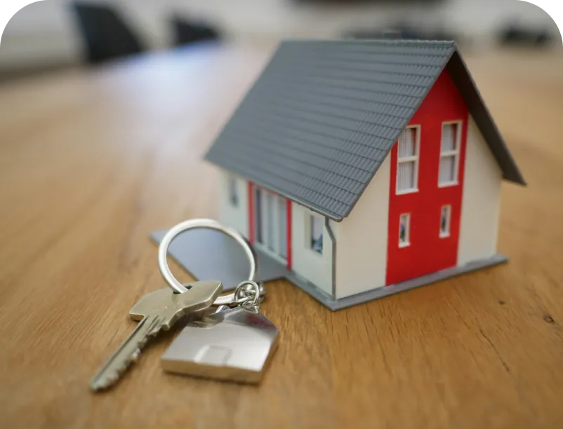 A set of key-rings with a mini ornament of a house attached to them