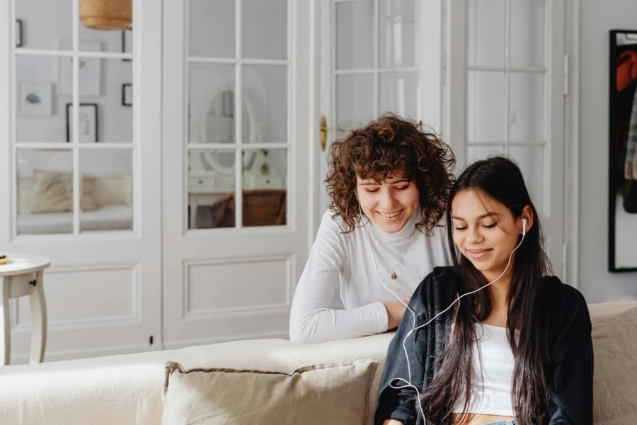 Music fans listening to favorite songs and creating personal song rankings online