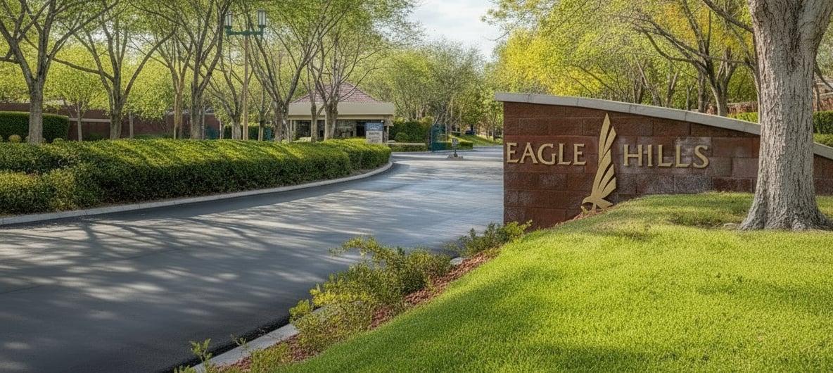 Eagle Hills guard-gated entrance sign in Summerlin Las Vegas with mature landscaping, tree-lined streets, and luxury community entrance near 9209 Eagle Hills Drive.