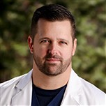 Portrait of Dr. John Thomas, functional medicine physician