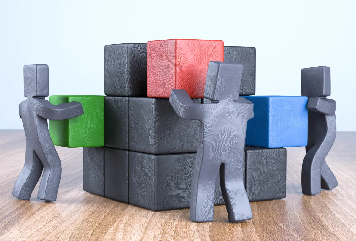 Support the Spectrum course image showing a parent and clinician discussing charts at a kitchen table.