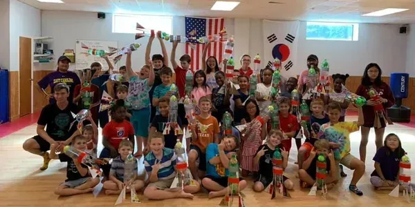 Summer camp children doing crafts