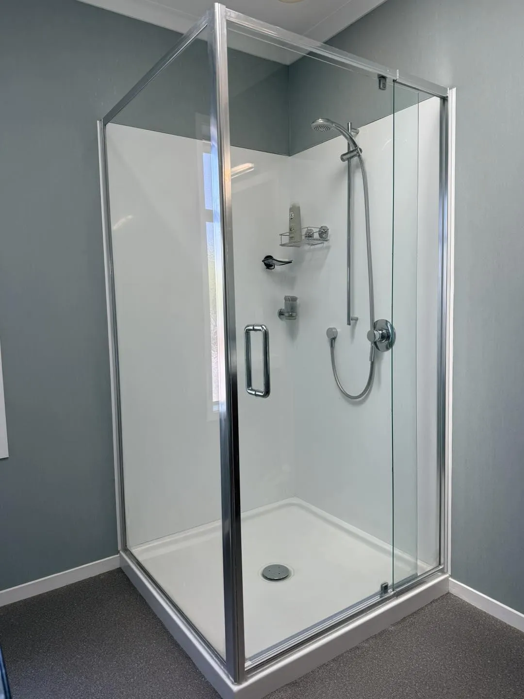 Restored glass shower after professional clean in Mount Maunganui