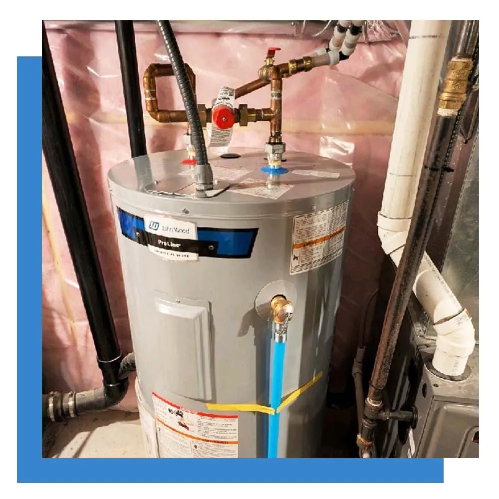 A new water heater installation with a shut off and mixing valve. 