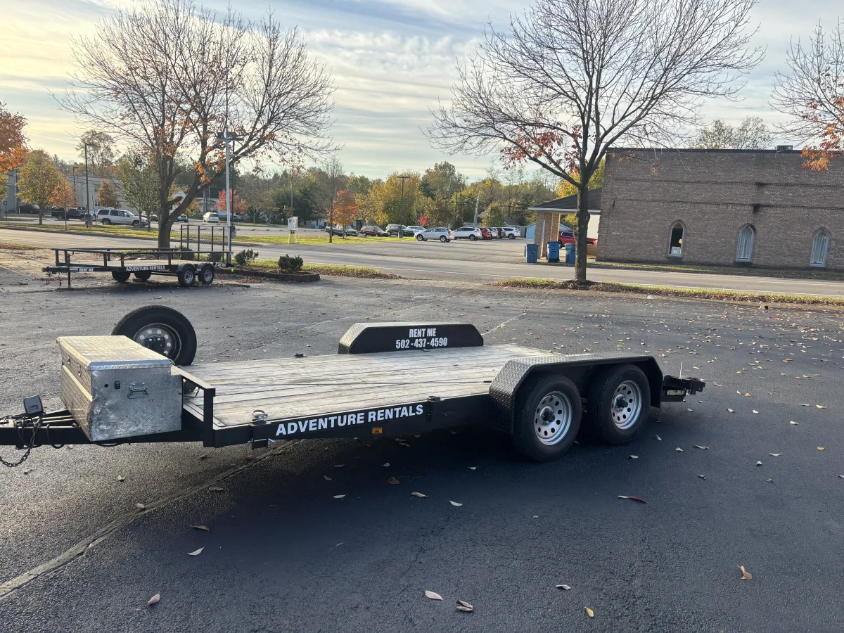 Adventure Rentals car hauler trailer with a front mounted toolbox add-on