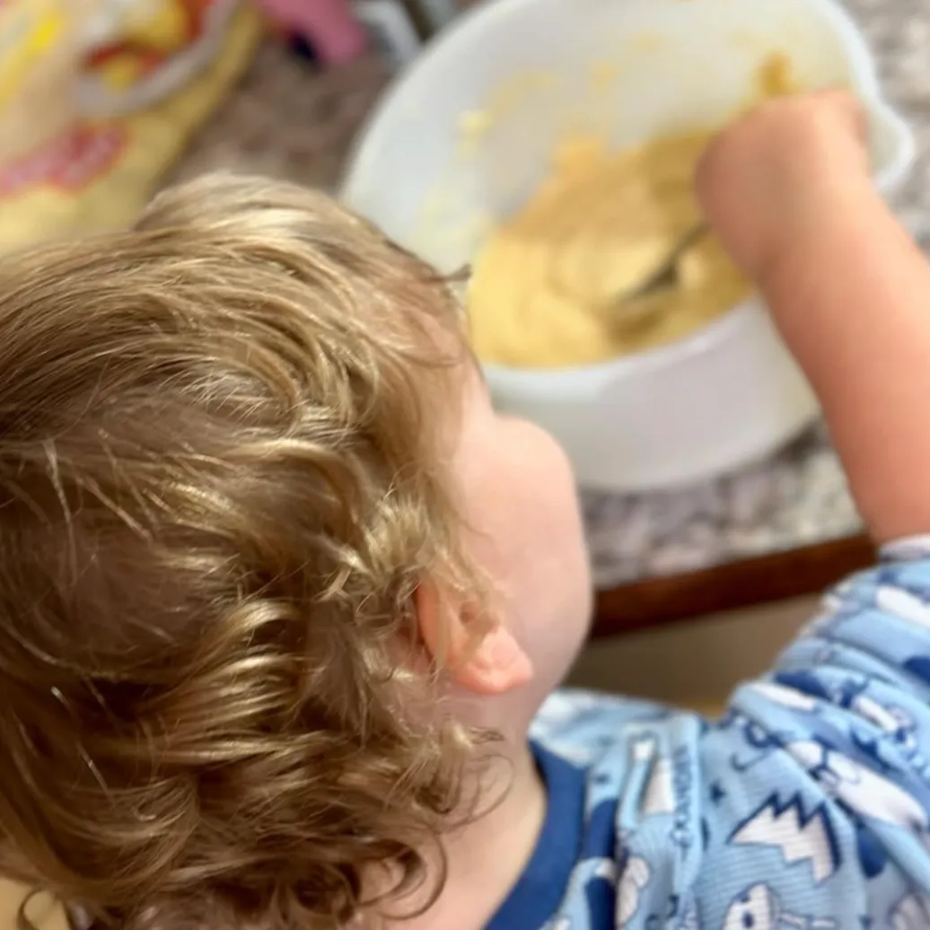 toddler eating healthy meal for family nutrition support