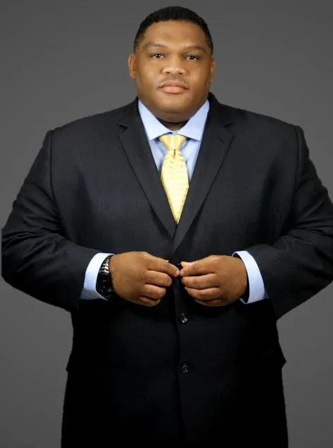 Attorney, Thomas H. Clifton, dressed in black suit