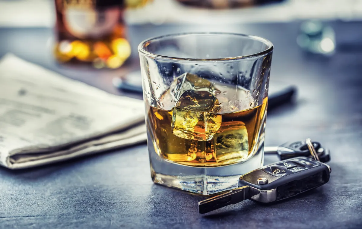 Alcohol in a glass cup on a table