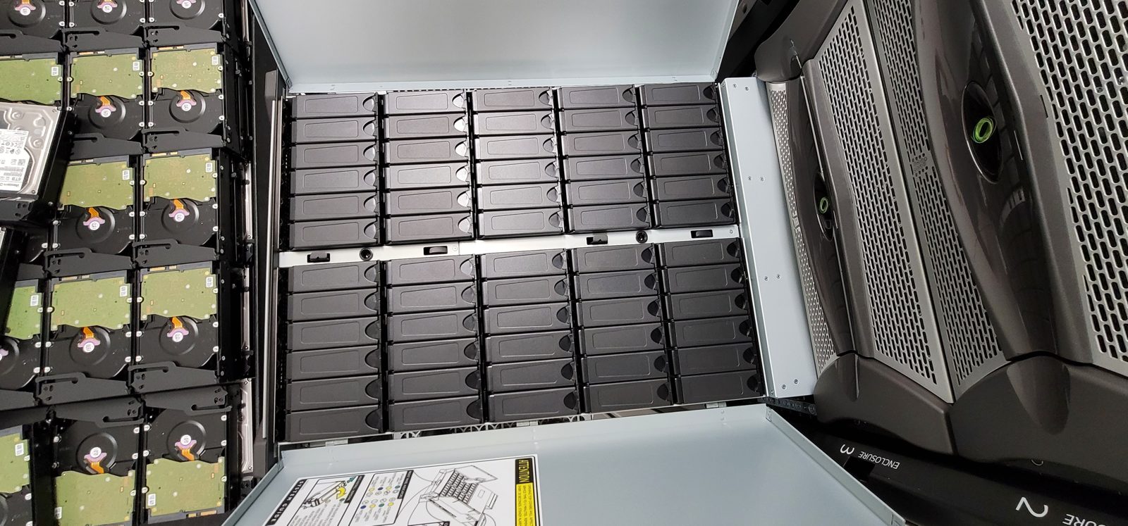 High-density storage drawer fully loaded with drives during a data center install by All Soul Tech
