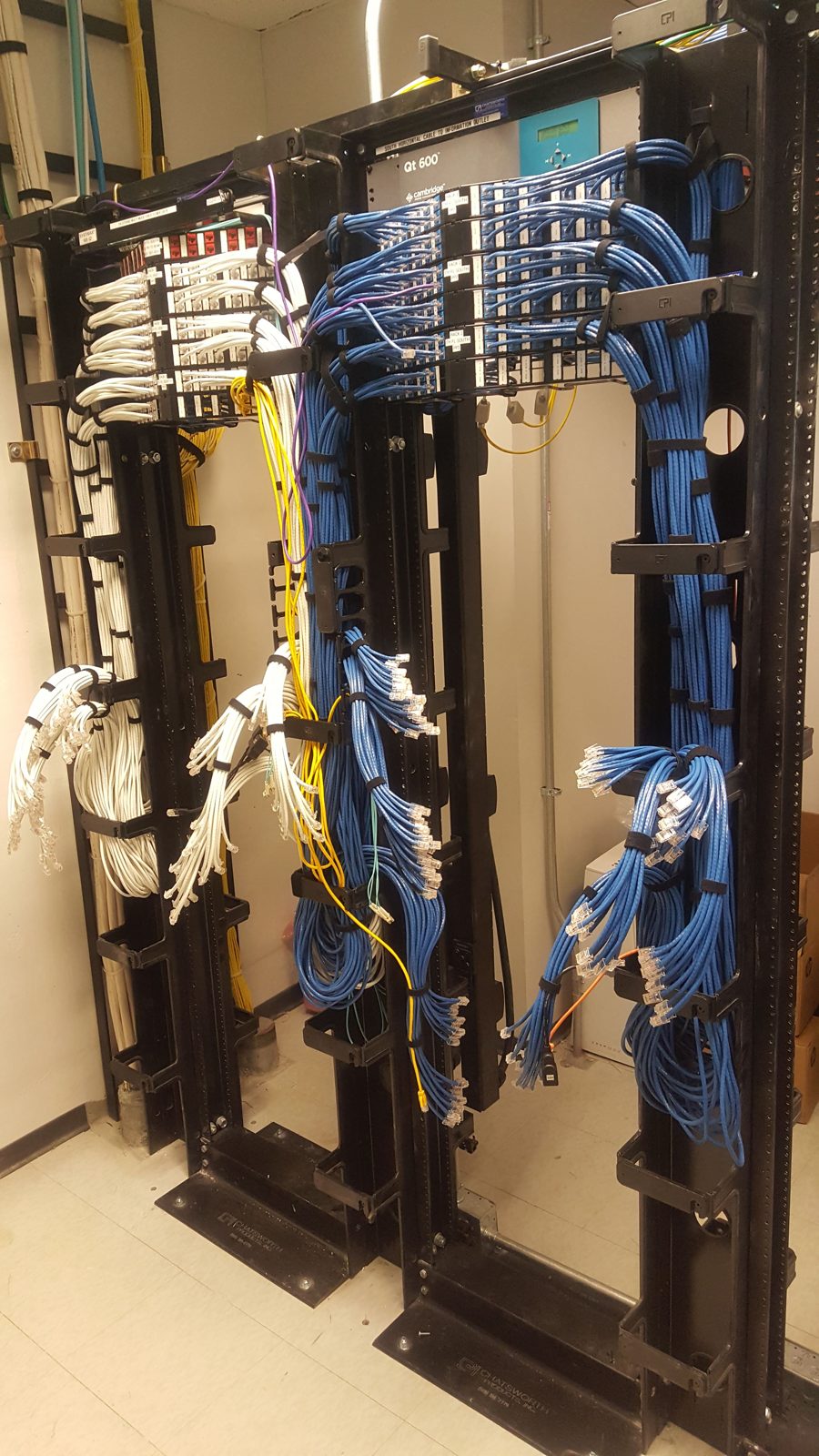 Two post racks vertical managers installed by All Soul Tech in Colorado