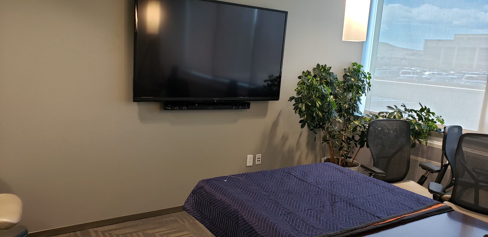 Office wall TV soundbar installed by All Soul Tech in Colorado