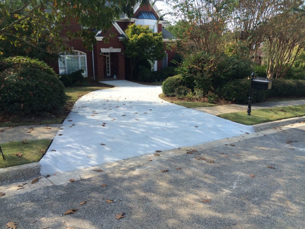 Alabaster Concrete levels sidewalks.