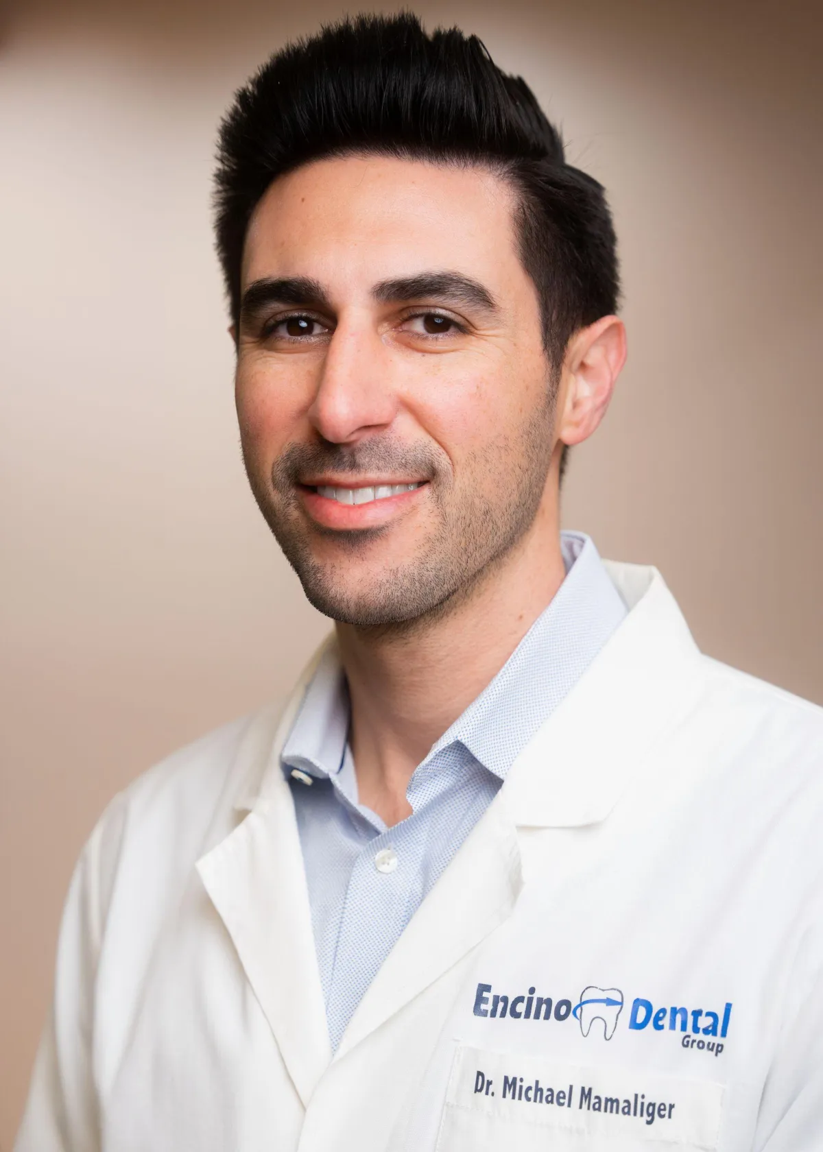 [IMAGE — Professional headshot of Dr. [NAME] in white lab coat, smiling, in office setting]