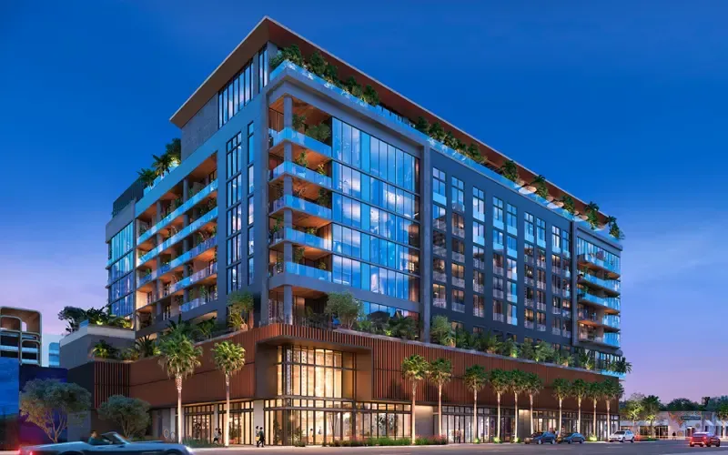 One West Turbine promotional image showing modern facade and streetscape, 3:2 landscape crop.