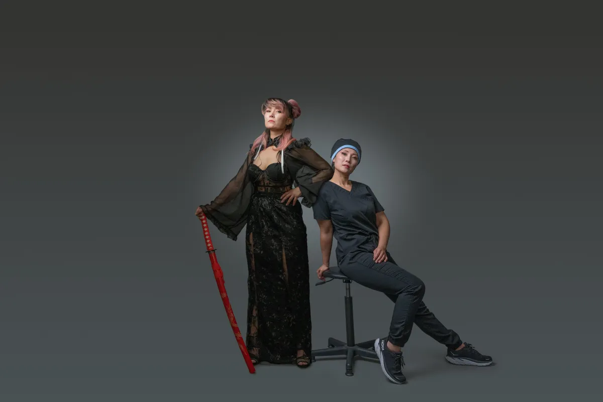 Surgeon prepares tools in the operating room.