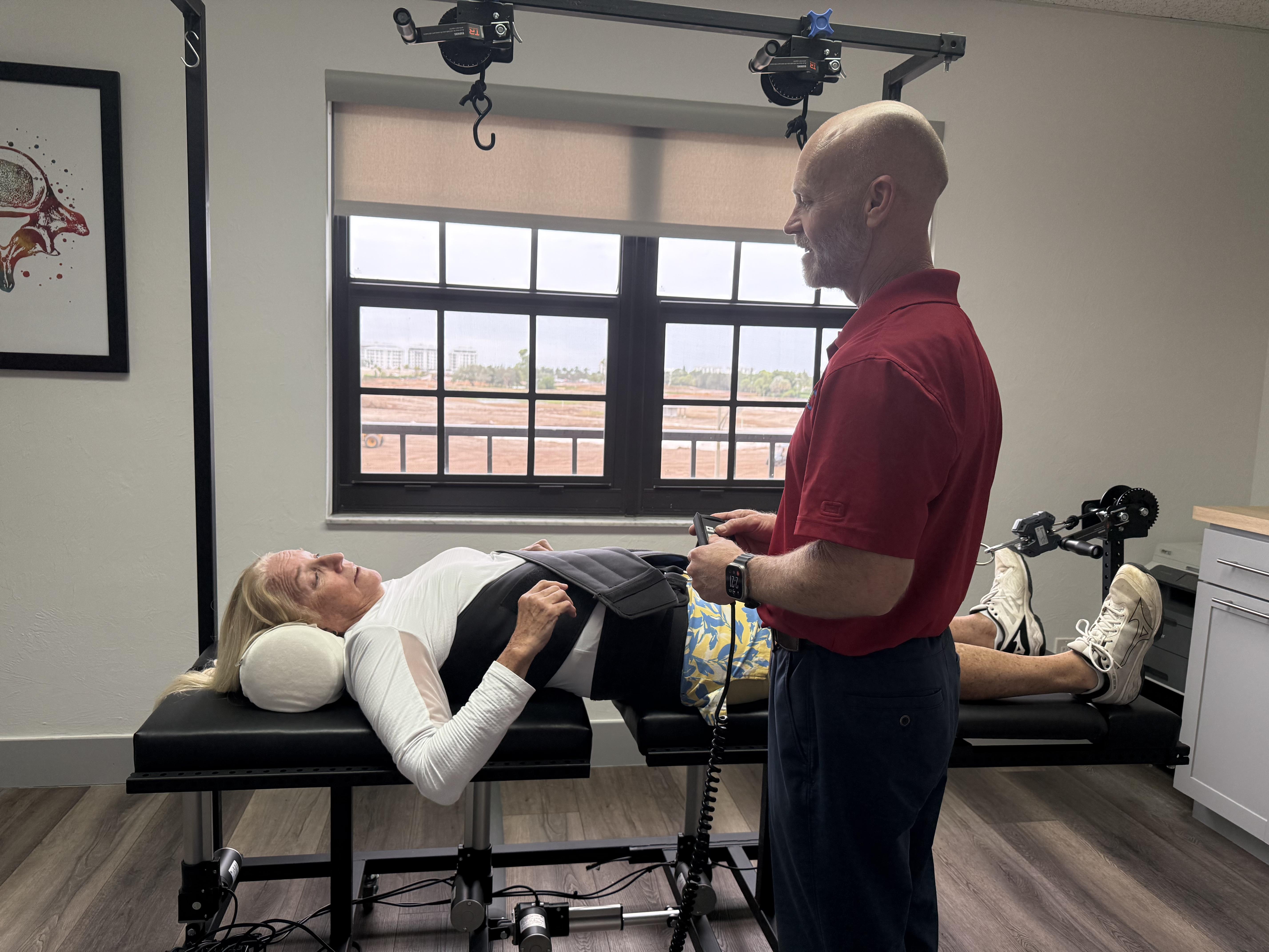 brown and black clipboard with white spinal cord print manual
