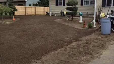 Residential lawn being prepared for thatching and aeration service