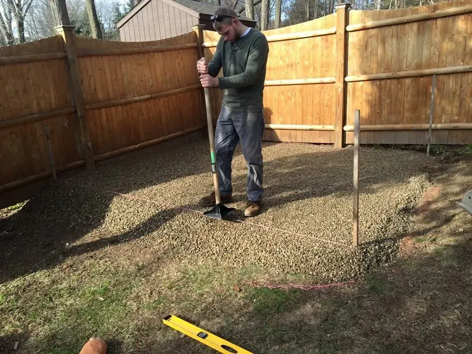 Chris of Leclerc & Son Lawn Care working on a landscaping project in Southampton, Massachusetts