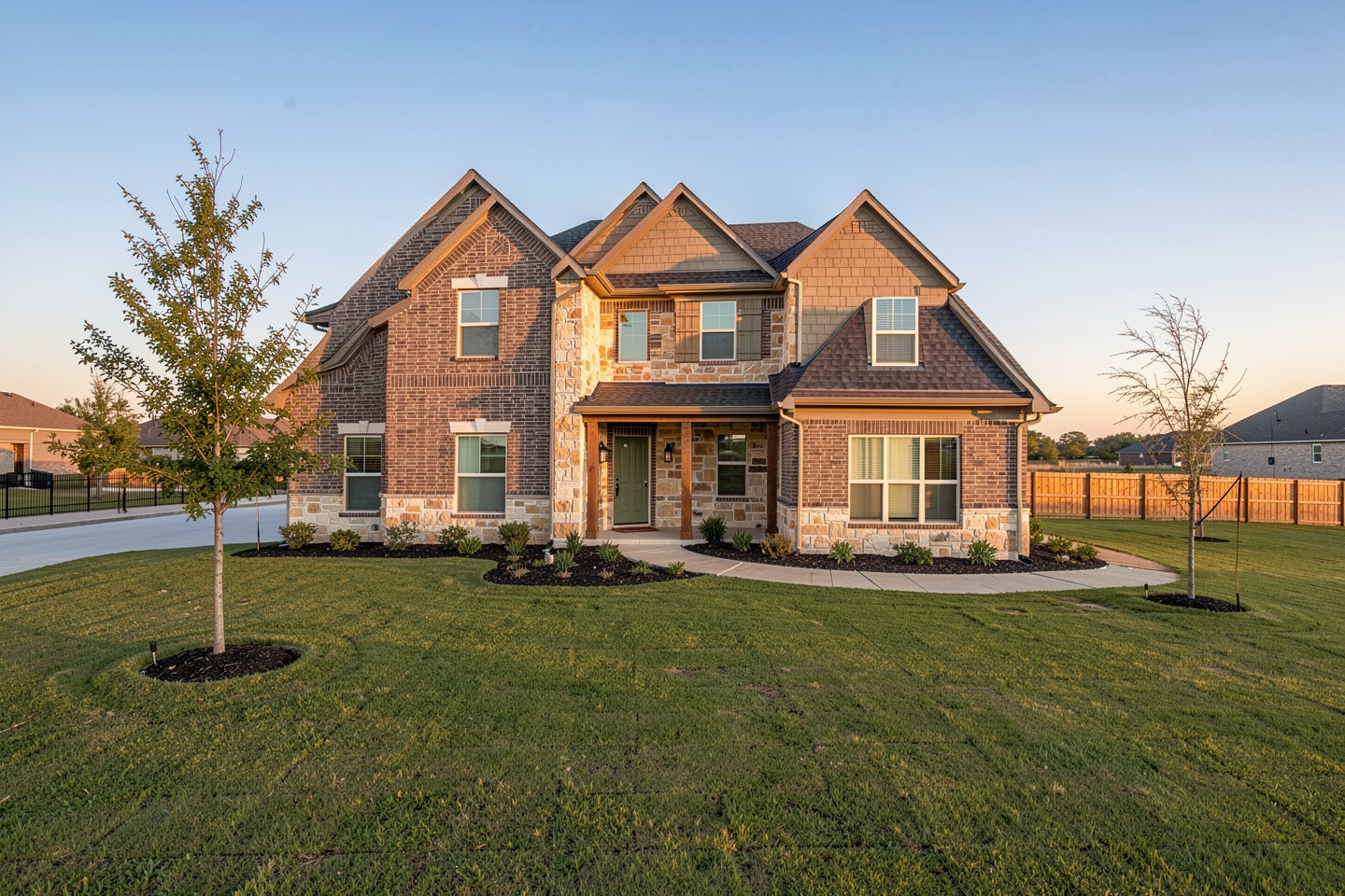 Newer two-story brick and stone home in a growing Aubrey, TX subdivision