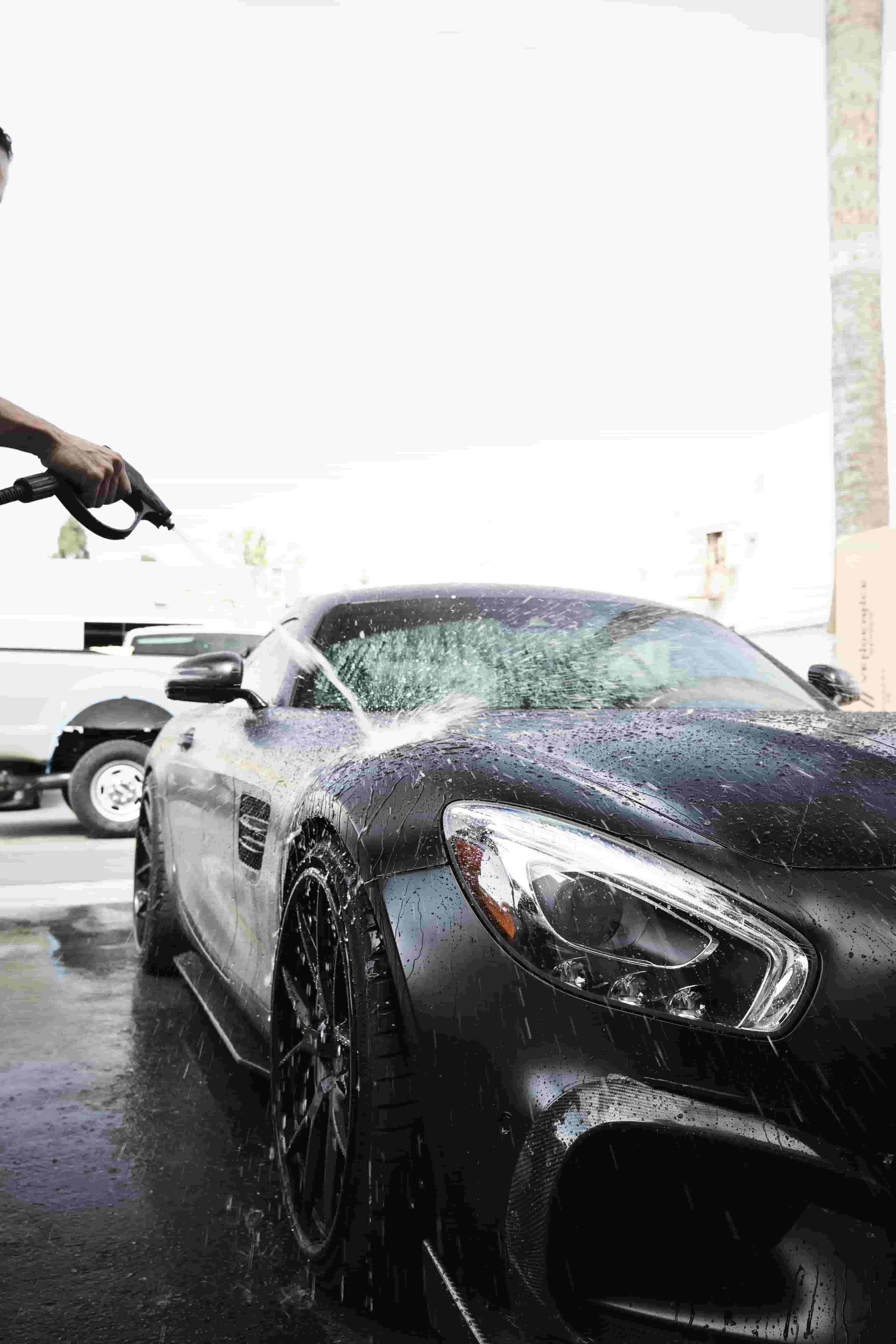 Luxury car being washed