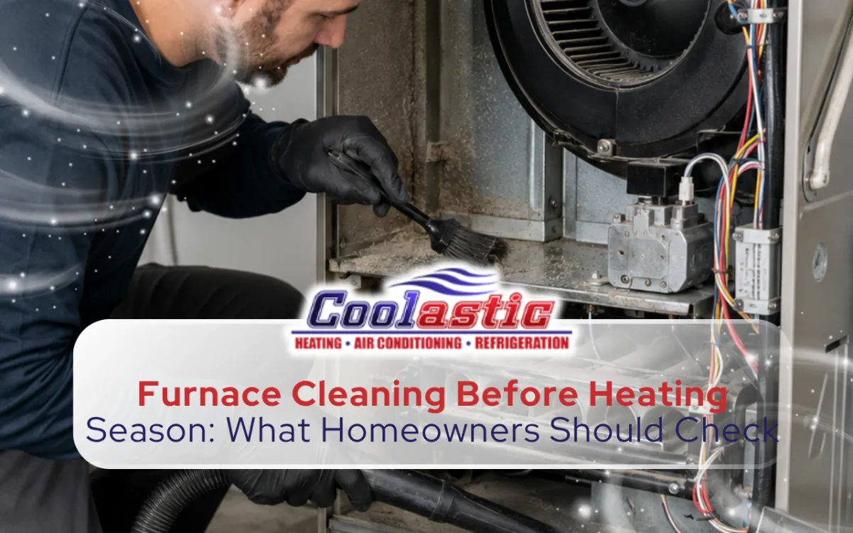 Furnace cleaning removing dust buildup from accessible heating components