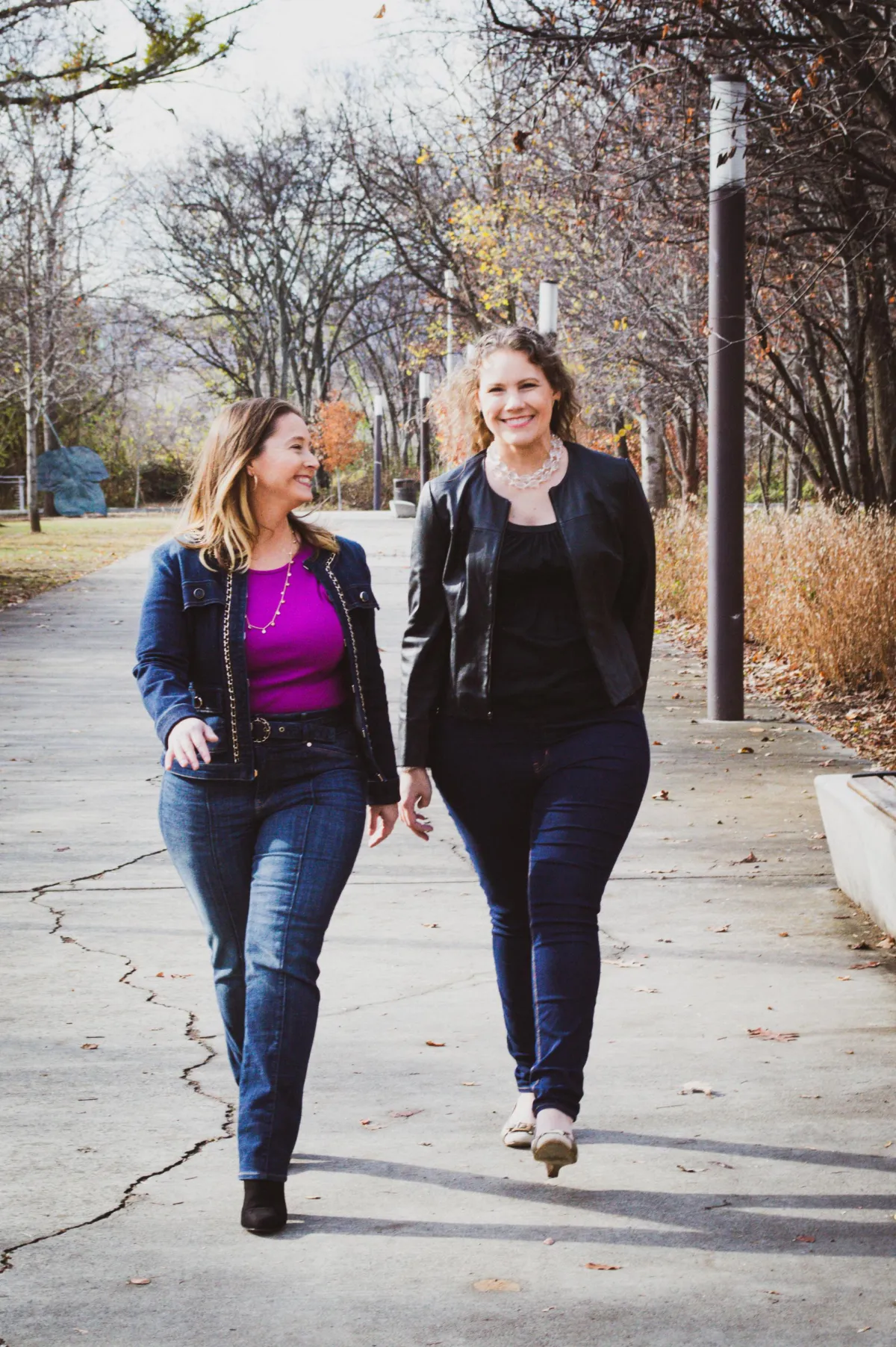Jen Myers and Dr. Leslie Jensen-Inman walking outside