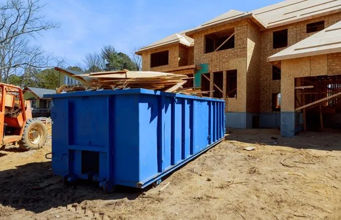 Highland Park delivers dumpsters for construction.