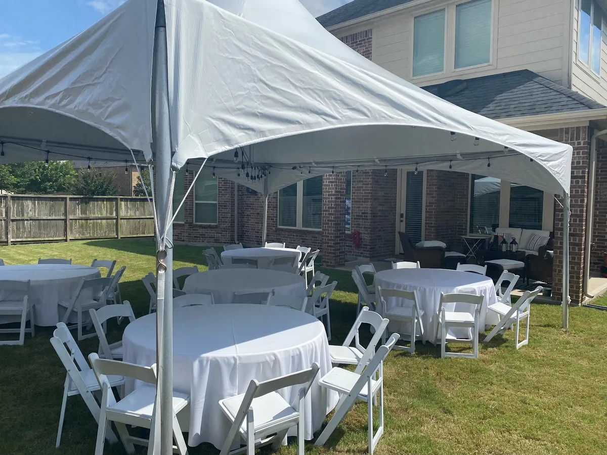 Round tables and chairs set for a reception in Houston
