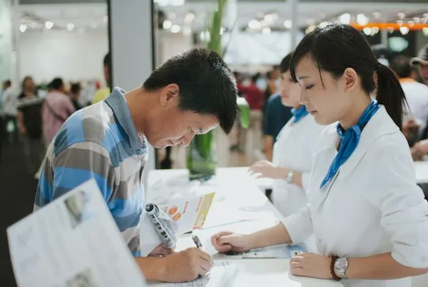 Person reviewing paperwork about a defective product claim