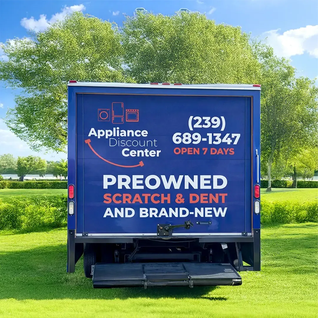 Appliance Discount Center delivery truck outside a Florida condominium