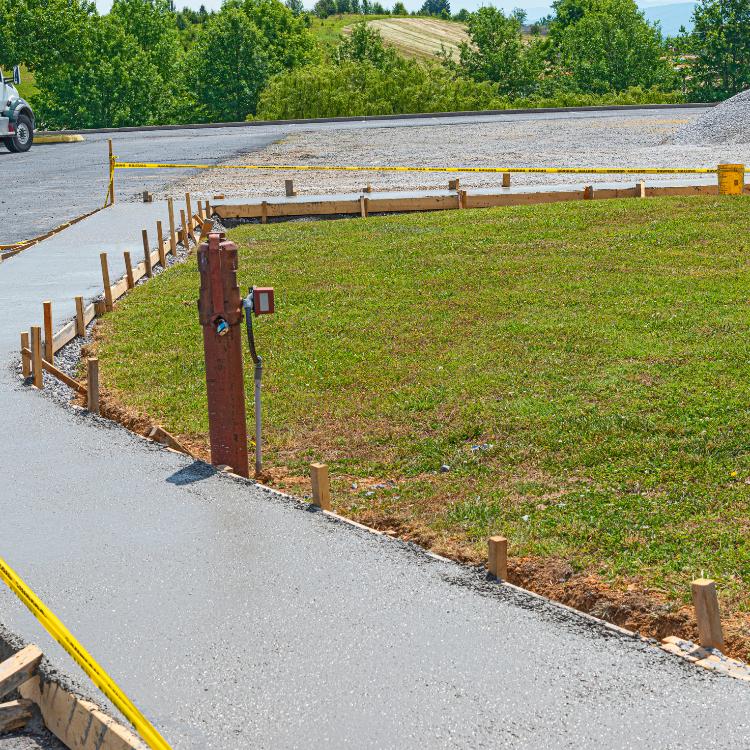 Concrete sidewalk being poured