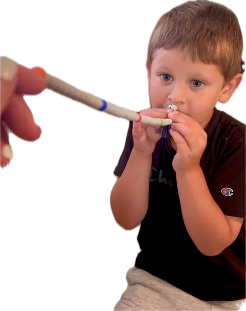 Boy doing eye teaming exercises