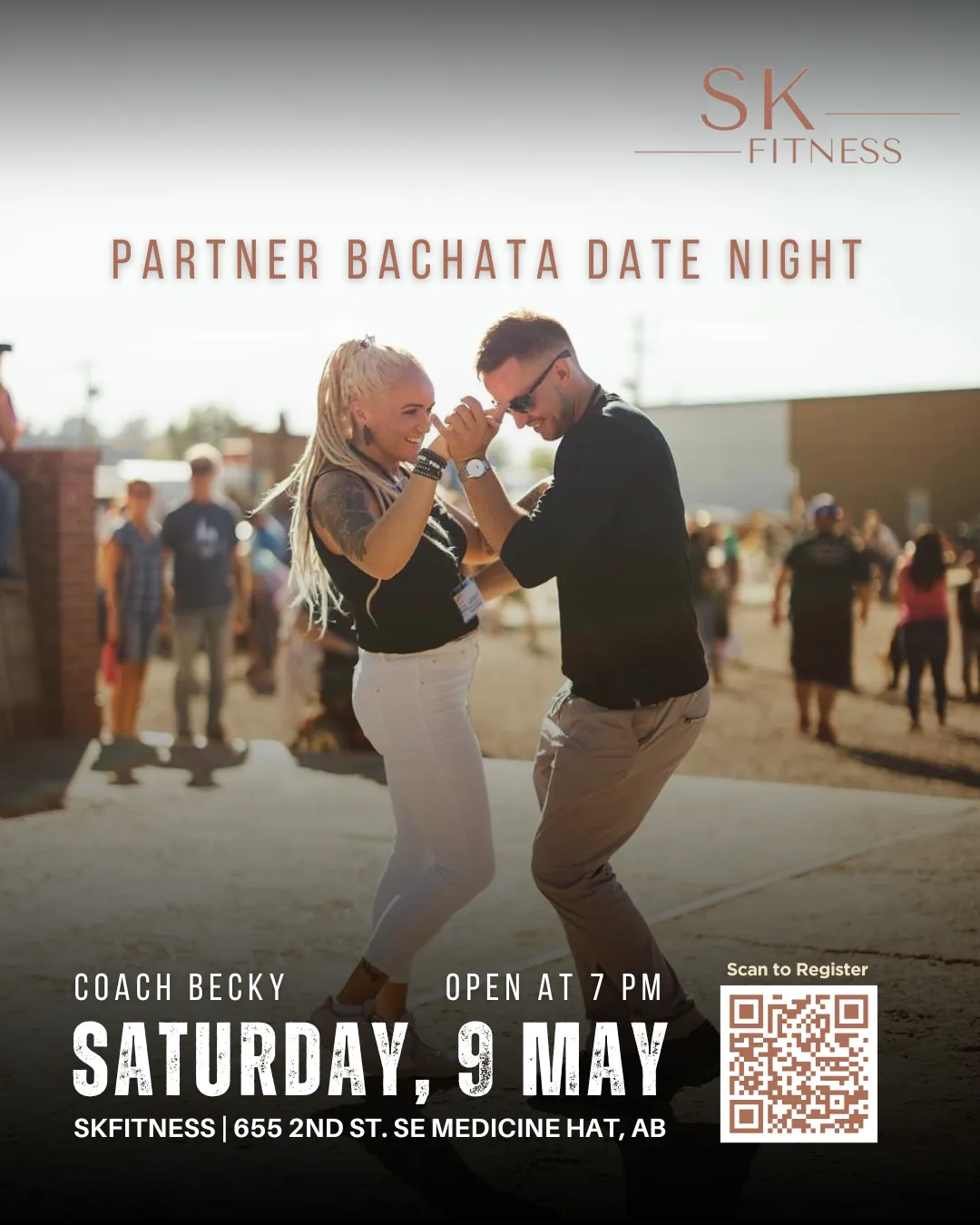 Night-time exterior of SKFitness Studio storefront with neon magenta signage and attendees arriving