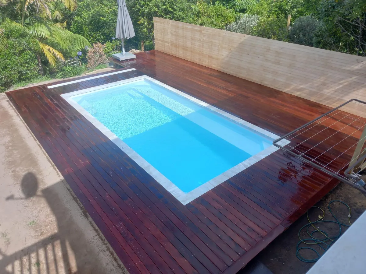 7. Timber privacy fence and raised pool deck around in-ground pool