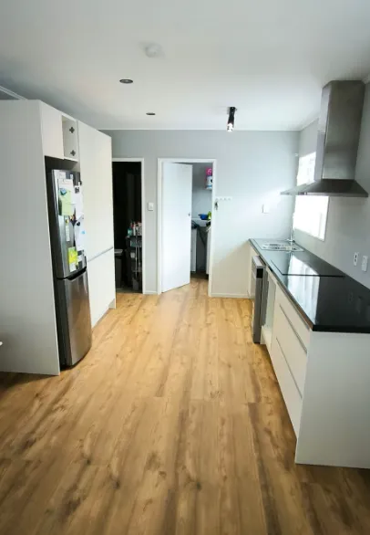 Modern kitchen renovation with timber flooring in Wellington