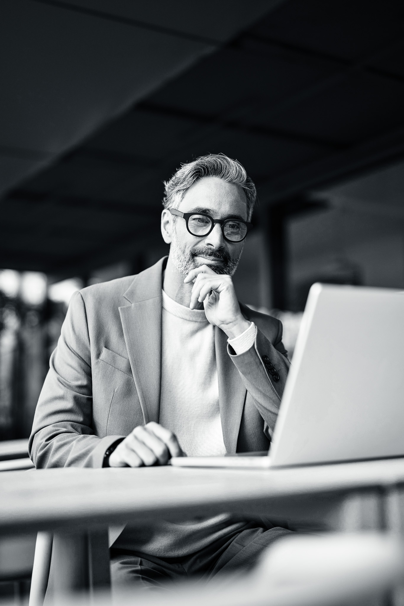 two person looking at clear white board.
