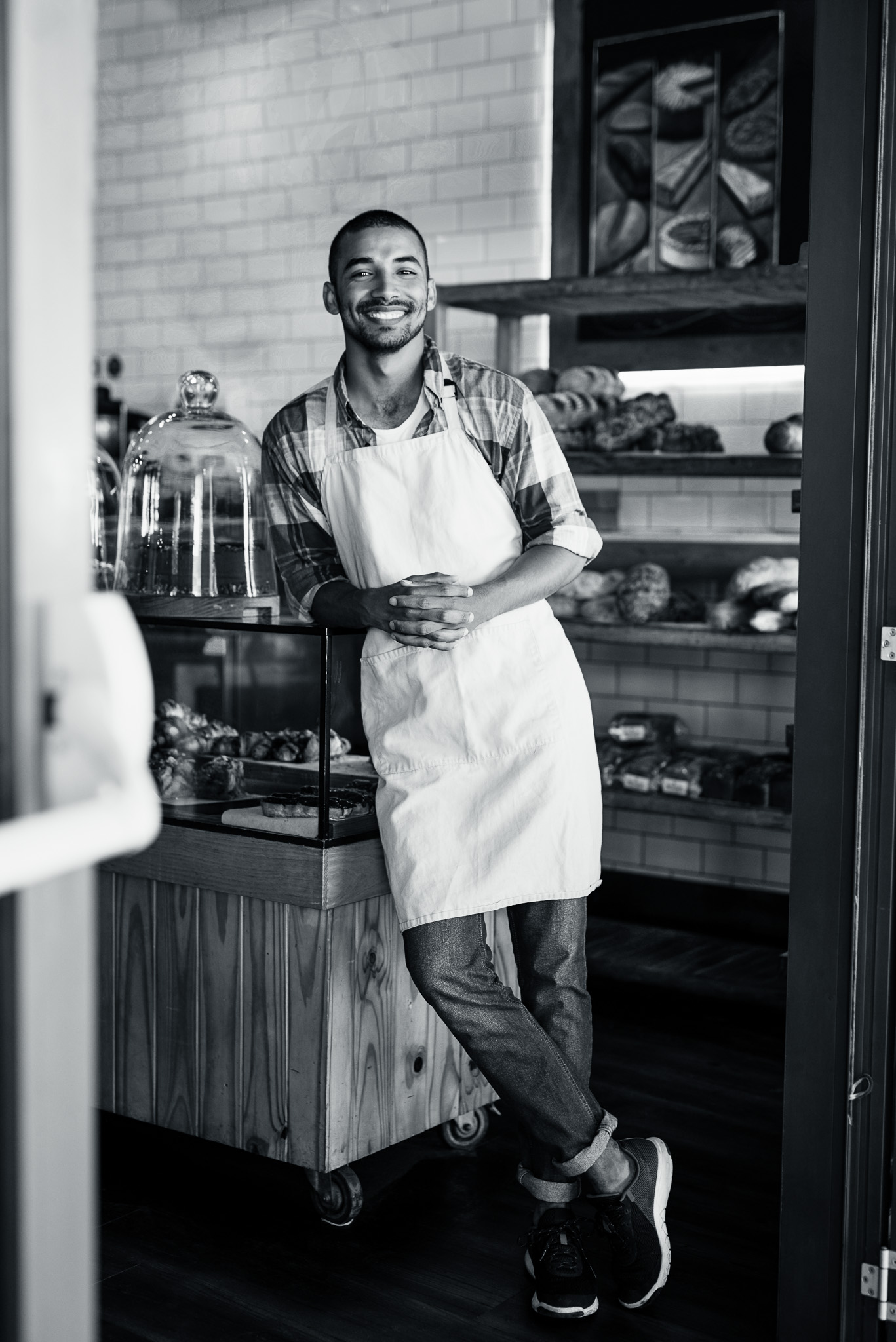 woman placing sticky notes on wall
