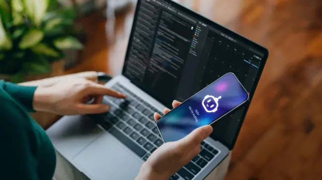 AI virtual receptionist answering customer enquiries on smartphone and laptop for business automation