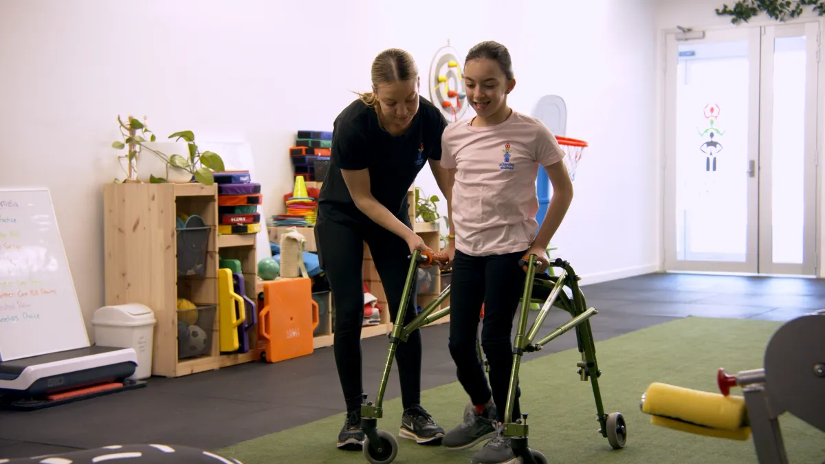 child praticing walking