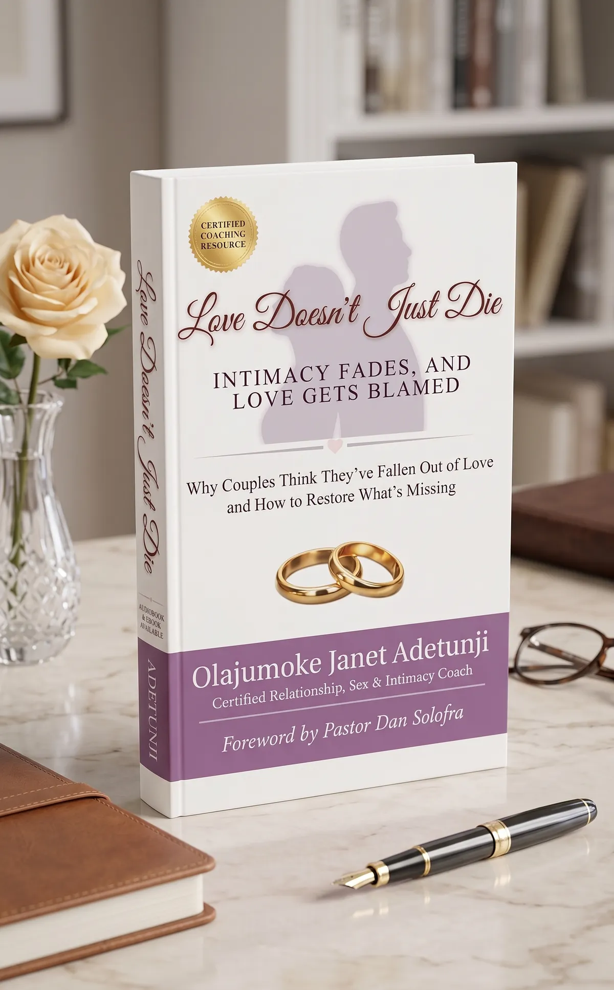 Cover of a book titled 'Love Doesn't Just Die' shown in a 3D mockup