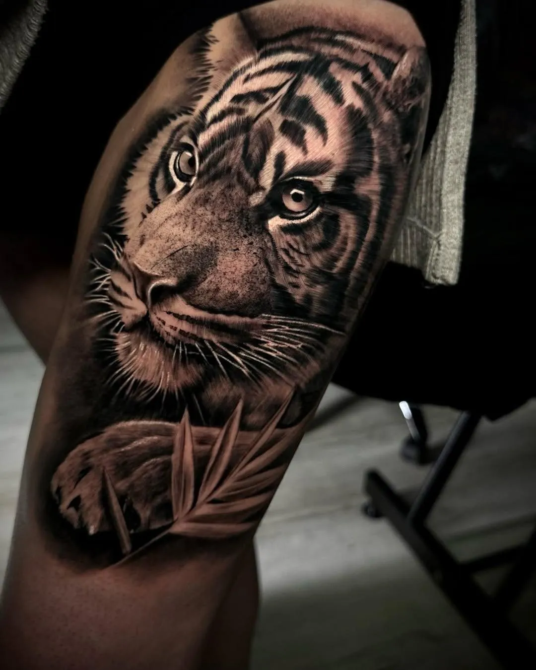 person with tattoo on right arm