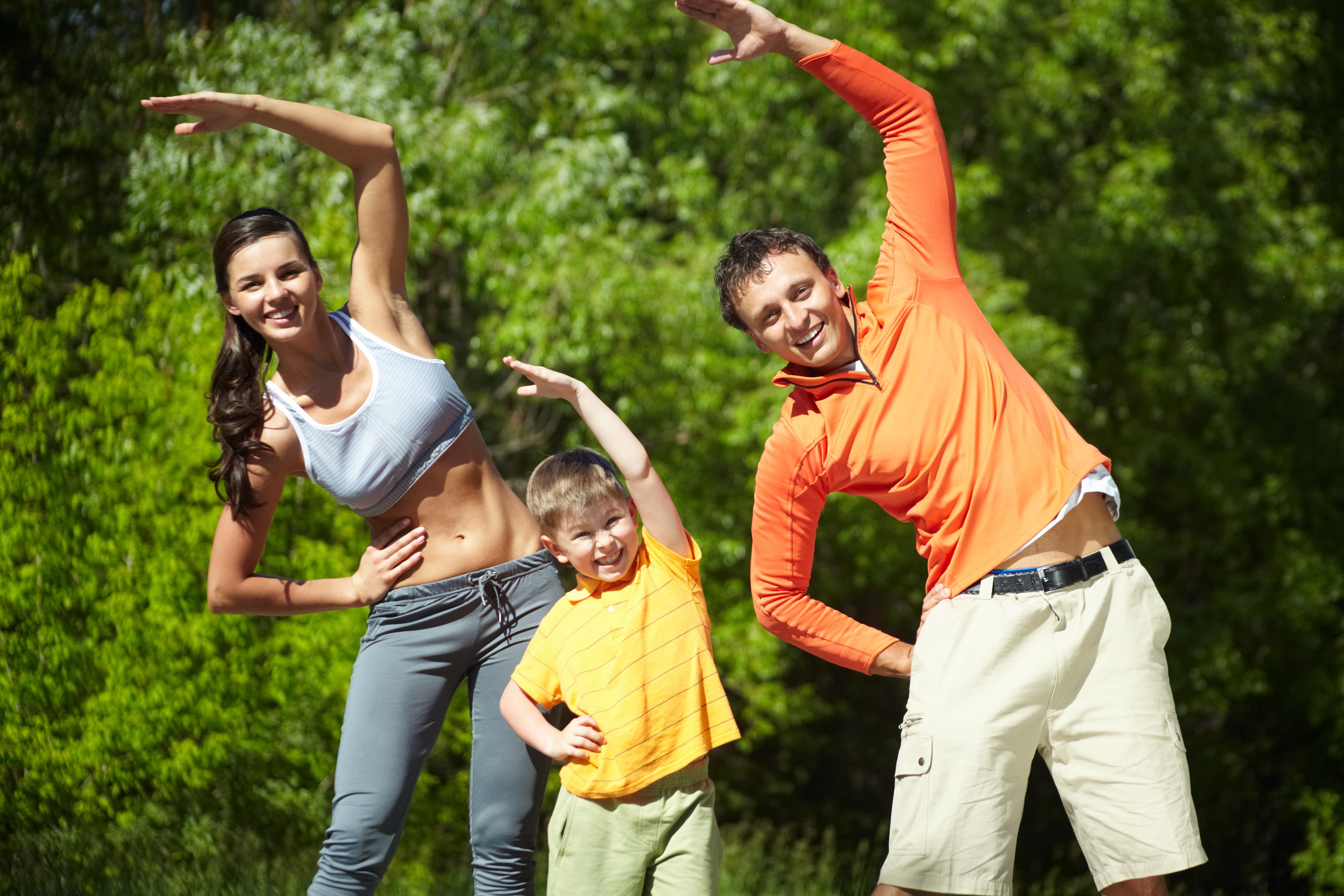 Parents playing with their daughter and son