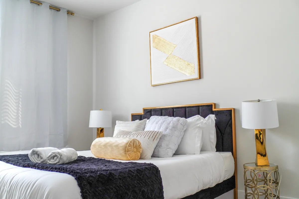 Well-appointed bedroom in a boutique Airbnb with tasteful furnishings.