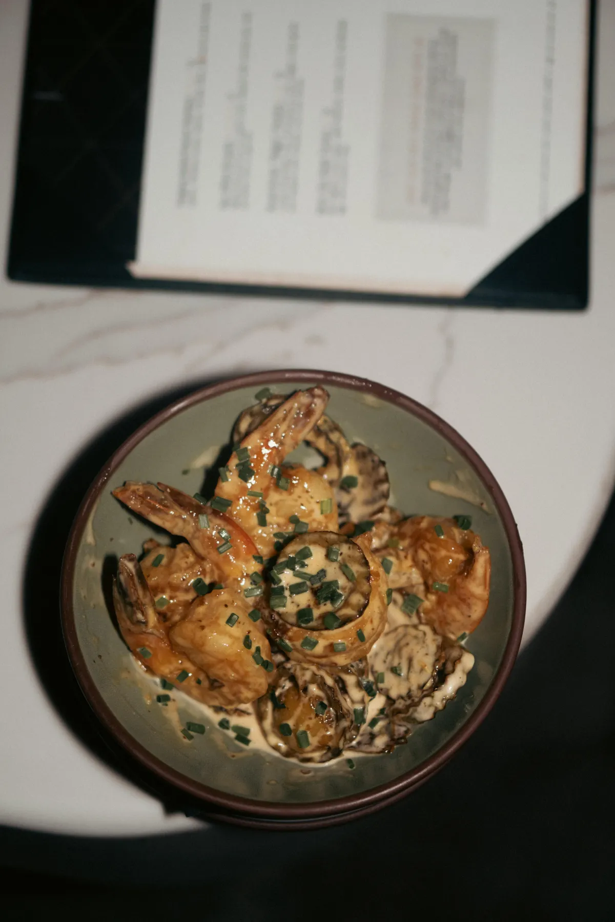 Gourmet entrée presented with refined styling and fresh ingredients.