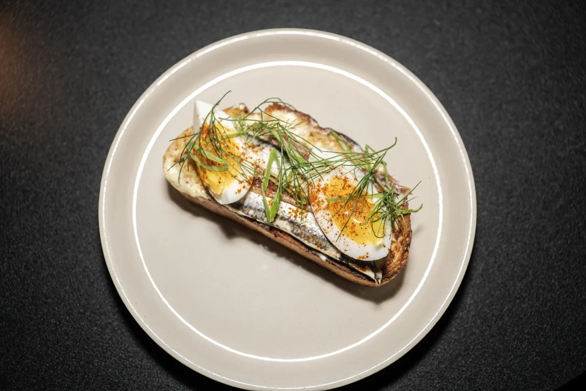 Elegant restaurant dish captured with natural lighting and cinematic detail.