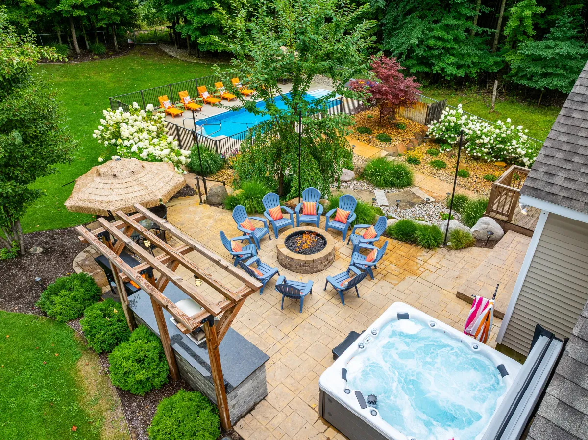 Luxury vacation rental in Fennville MI — Swimming in the Sunset with private pool, hot tub, fire pit, and steps from Lake Michigan